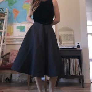 Black quilted midi skirt